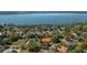 Scenic aerial view of the house near a lake showcasing the property's surroundings at 2506 Partridge Dr, Winter Haven, FL 33884