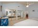 Bedroom with a coastal theme and a large mirrored closet doors at 2506 Partridge Dr, Winter Haven, FL 33884