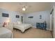 Bedroom with vaulted ceilings, coastal decor, and two beds at 2506 Partridge Dr, Winter Haven, FL 33884