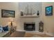 Bright living room with hardwood floors and fireplace at 2506 Partridge Dr, Winter Haven, FL 33884