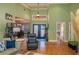 Spacious living room with hardwood floors, comfortable seating, and stylish decor with access to the dining room at 2506 Partridge Dr, Winter Haven, FL 33884