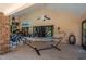 Spacious covered patio features a hammock, seating area, and fan, perfect for relaxing outdoors at 2506 Partridge Dr, Winter Haven, FL 33884