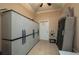 Storage room features wall-to-wall storage cabinets, providing plenty of organizational space at 2506 Partridge Dr, Winter Haven, FL 33884