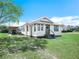 Charming single-story home with a well-maintained lawn and covered carport, perfect for a Gathering at 2606 Tall Palm Ave, Lake Wales, FL 33898