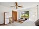 Bedroom featuring a seating area near a window, a fan, and built in storage at 2637 Sunburst Ct, Lake Wales, FL 33898