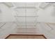 Walk-in closet with wall-to-wall wire shelving at 2637 Sunburst Ct, Lake Wales, FL 33898