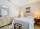Charming bedroom featuring a soft color palette, dresser, and comfortable furnishings at 2723 Rutledge Ct, Winter Haven, FL 33884