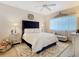 Elegantly decorated bedroom with a plush bed, stylish furnishings, and ample natural light at 2723 Rutledge Ct, Winter Haven, FL 33884