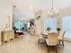 Bright living room with an open floor plan that connects to the dining room at 2723 Rutledge Ct, Winter Haven, FL 33884