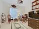 Traditional office with a wooden desk, ample storage, and neutral carpet at 2723 Rutledge Ct, Winter Haven, FL 33884