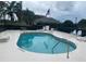 Relaxing community pool area features lounge chairs and a refreshing, cool blue pool at 2723 Rutledge Ct, Winter Haven, FL 33884