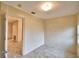 Well-lit bedroom with tiled floors, and neutral paint, providing a bright, blank canvas at 3065 E Central Ave, Bartow, FL 33830