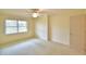 Bright bedroom with a ceiling fan and a window providing natural light at 3065 E Central Ave, Bartow, FL 33830