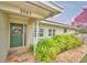 Charming home entrance featuring a decorative front door and brick pathway at 3065 E Central Ave, Bartow, FL 33830