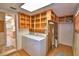 A functional laundry room is well-equipped and organized at 3065 E Central Ave, Bartow, FL 33830