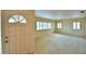 Living room with a view of the front door and bright windows at 3065 E Central Ave, Bartow, FL 33830