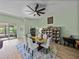 Spacious dining room with seating for six, bright light, and views to the kitchen at 3686 Plymouth Dr, Winter Haven, FL 33884