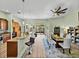 Bright dining area that features a ceiling fan, table with seating and views to the patio at 3686 Plymouth Dr, Winter Haven, FL 33884