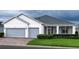 Charming single story home with a brick driveway, well-maintained landscaping, and a two car garage at 3686 Plymouth Dr, Winter Haven, FL 33884