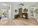 Entryway and living space with hard flooring, a ceiling fan, and ample natural light at 3686 Plymouth Dr, Winter Haven, FL 33884