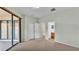 This carpeted bedroom has a sliding glass door that leads to an outdoor patio at 369 Villa Sorrento Cir, Haines City, FL 33844