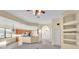 Bright and airy living room with a view of the kitchen and front entryway at 369 Villa Sorrento Cir, Haines City, FL 33844