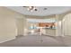 Open-concept living room with tile flooring and a view of the kitchen at 369 Villa Sorrento Cir, Haines City, FL 33844