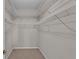 A well-organized walk-in closet with ample shelving space at 369 Villa Sorrento Cir, Haines City, FL 33844