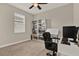 This bonus room has natural light and storage shelves, ideal for use as an office or reading area at 3711 Plymouth Dr, Winter Haven, FL 33884