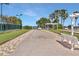 Outdoor bocce ball court featuring lush landscaping, shade, and comfortable seating for players and spectators at 3711 Plymouth Dr, Winter Haven, FL 33884