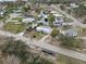 An aerial view showing this house with waterfront access and neighborhood at 4024 Canal Rd, Lake Wales, FL 33898