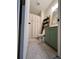 Bathroom features a shower/tub combo, unique shelving and a vanity at 4024 Canal Rd, Lake Wales, FL 33898