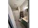 Bathroom features a shower/tub combo, unique shelving and a vanity at 4024 Canal Rd, Lake Wales, FL 33898