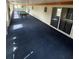 Large game room featuring long windows, blue carpeting, and a pool table perfect for relaxation and entertainment at 4024 Canal Rd, Lake Wales, FL 33898