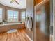 Well-lit bathroom with a glass-enclosed shower and a separate soaking tub at 4073 Sable Loop Dr, Lake Wales, FL 33859