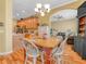 Open-concept eat-in kitchen and dining area at 4073 Sable Loop Dr, Lake Wales, FL 33859