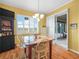 Bright dining area with natural light and a view of the outdoors at 4073 Sable Loop Dr, Lake Wales, FL 33859