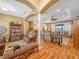 Open concept living room featuring hardwood floors, and plenty of space for entertaining at 4073 Sable Loop Dr, Lake Wales, FL 33859