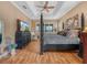 Relaxing main bedroom with a decorative ceiling and plenty of natural light at 4073 Sable Loop Dr, Lake Wales, FL 33859