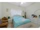 Bright bedroom with a comfortable bed, light walls, and ample natural light at 415 Ruby Lake Pl, Winter Haven, FL 33884