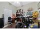 Multi-purpose room with exercise equipment, desk, and shelving at 415 Ruby Lake Pl, Winter Haven, FL 33884