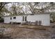 Backyard featuring a patio and outdoor seating at 428 Garrett Ridge Ct, Winter Haven, FL 33880