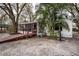 Exterior of a well-maintained single-story home with accessible ramp at 428 Garrett Ridge Ct, Winter Haven, FL 33880