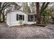 Exterior of a well-maintained single-story home with screened porch at 428 Garrett Ridge Ct, Winter Haven, FL 33880