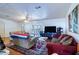 Cozy living room with bright natural light and comfortable furnishings at 428 Garrett Ridge Ct, Winter Haven, FL 33880