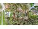 Aerial view shows the size of the homes lot with trees and foliage at 428 Garrett Ridge Ct, Winter Haven, FL 33880