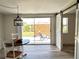 Bright dining area featuring sliding glass doors and a decorative sliding barn door at 4909 Fleetwood St, Lake Wales, FL 33859
