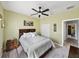 Neutral bedroom with carpet, neutral walls, a ceiling fan and window with blinds at 5304 Nicklaus Dr, Winter Haven, FL 33884