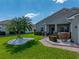 Charming home with meticulously landscaped front yard and inviting walkway leading to the entrance at 5304 Nicklaus Dr, Winter Haven, FL 33884