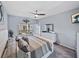Light and airy main bedroom with ceiling fan and a view of the backyard at 5304 Nicklaus Dr, Winter Haven, FL 33884